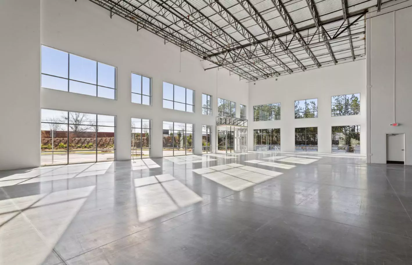 Large bright airy interior of 7250 Graham Rd with lots of big bright windows