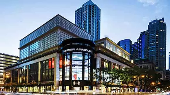 Multi-story retail building on busy street