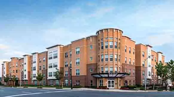 5-story apartment building on street corner